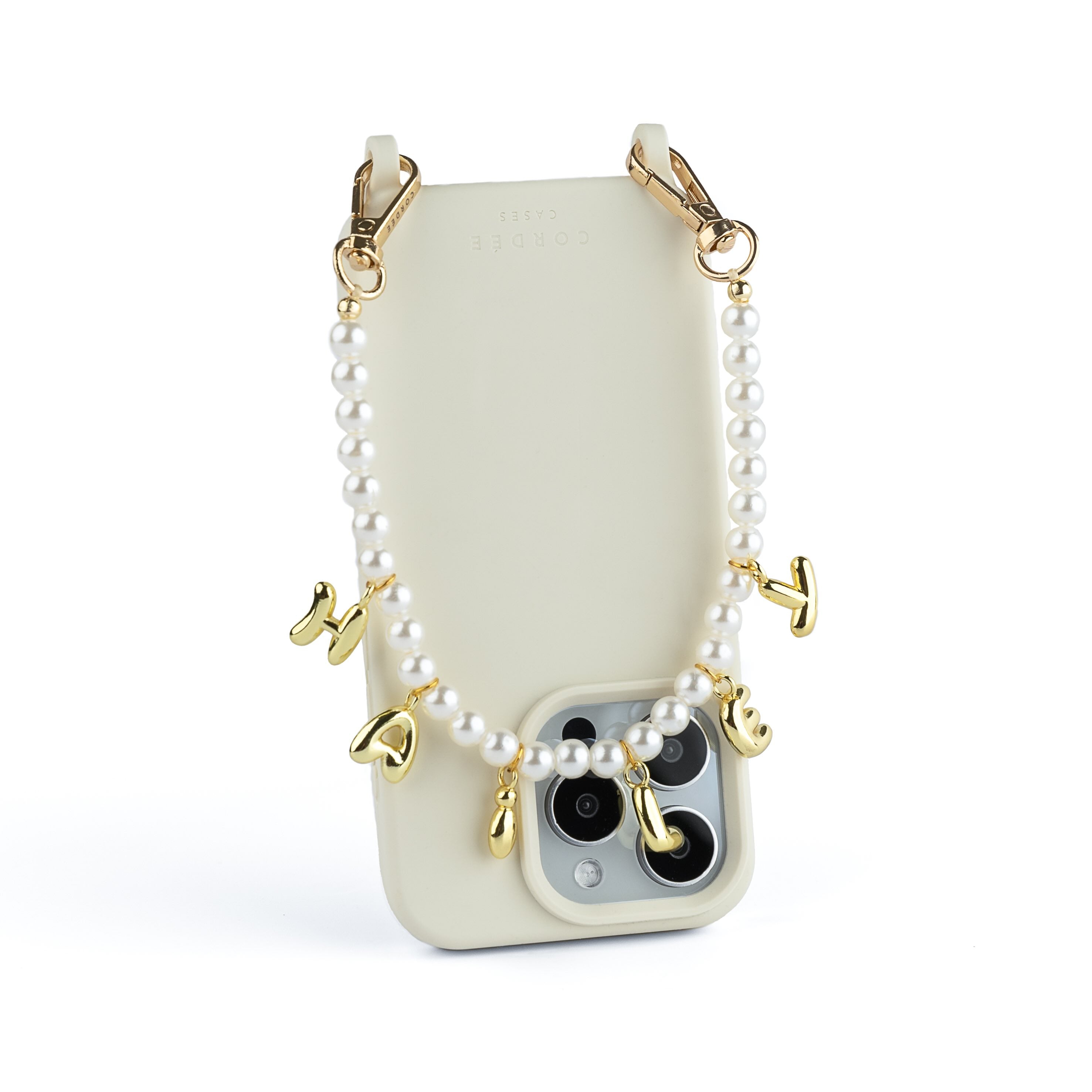 A white phone wristlet with pearl beads and customizable letter charms attached to it, displayed on a plain background.