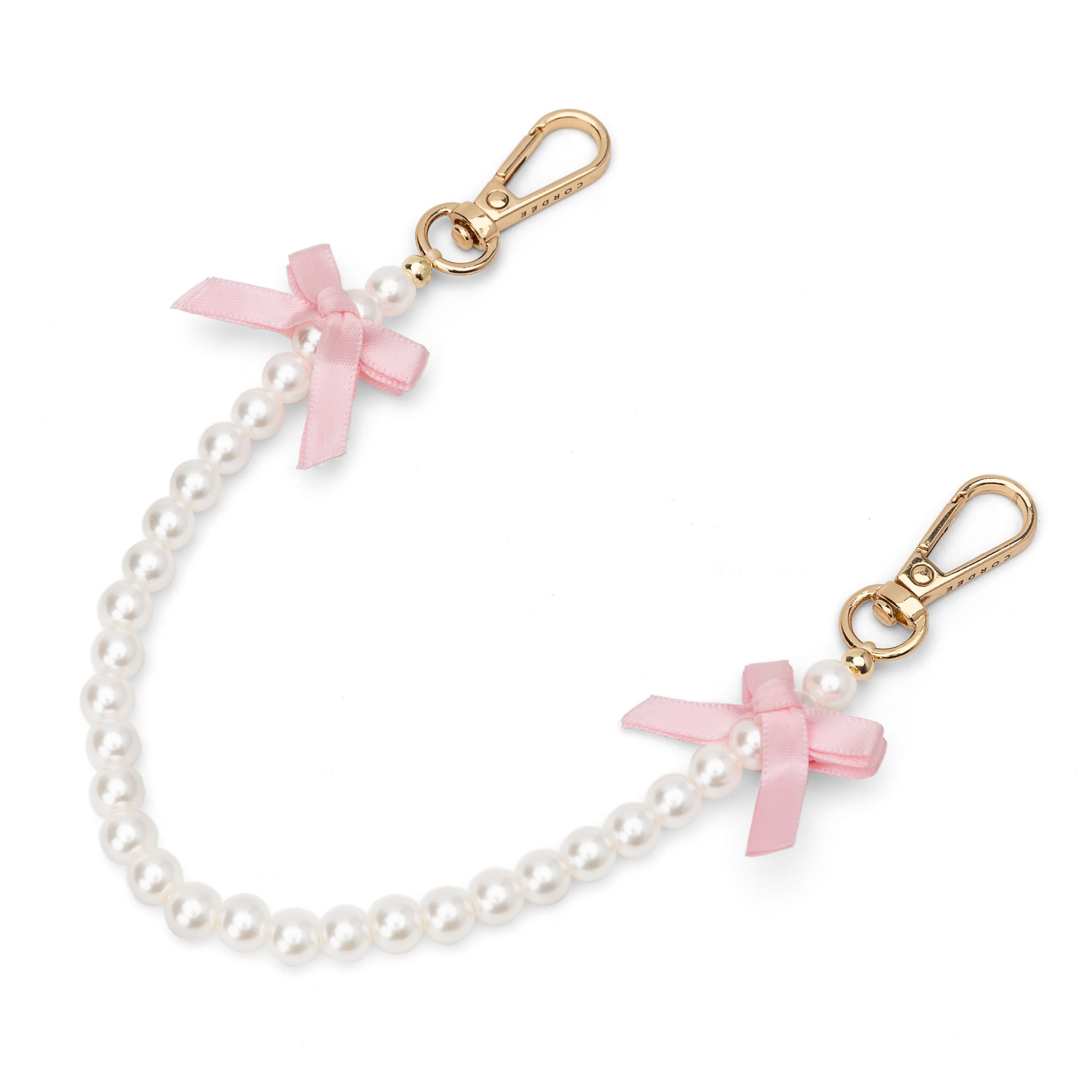 Pearl Bow Phone Wristlet Blush